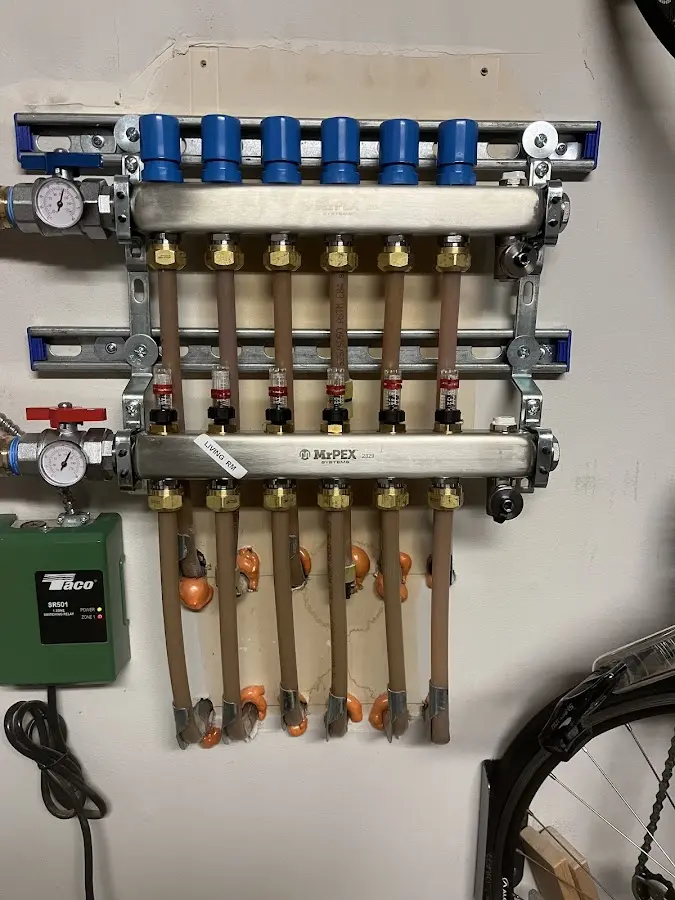 Plumber performing Gas Line Installation at a residential property in Cedarburg